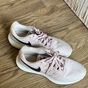 Nike Women’s Light Pink Athletic Sneakers with Black Swoosh